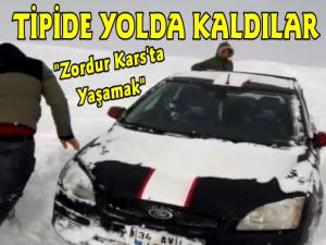 Kars'ta Tipi Nedeniyle Yolda Kalan Araç Kurtarıldı