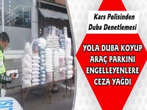 Kars'ta Trafik Ekipleri Yola Duba ve Eşya Koyan Esnaflara Ceza Yazdı