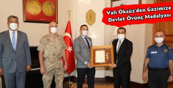 Vali Öksüz'den Gazimize Devlet Övünç Madalyası ve Beratı